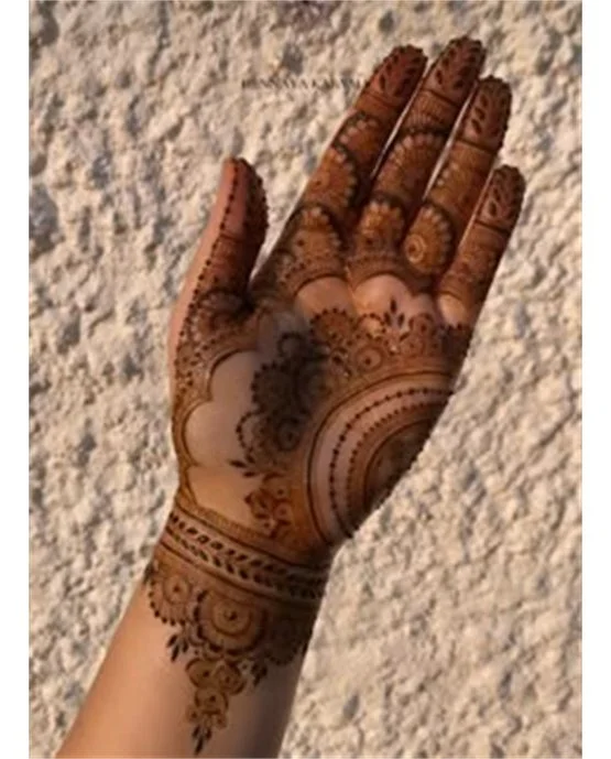 Detailed Fan With Cluster Covering Front Hand Mehndi Design